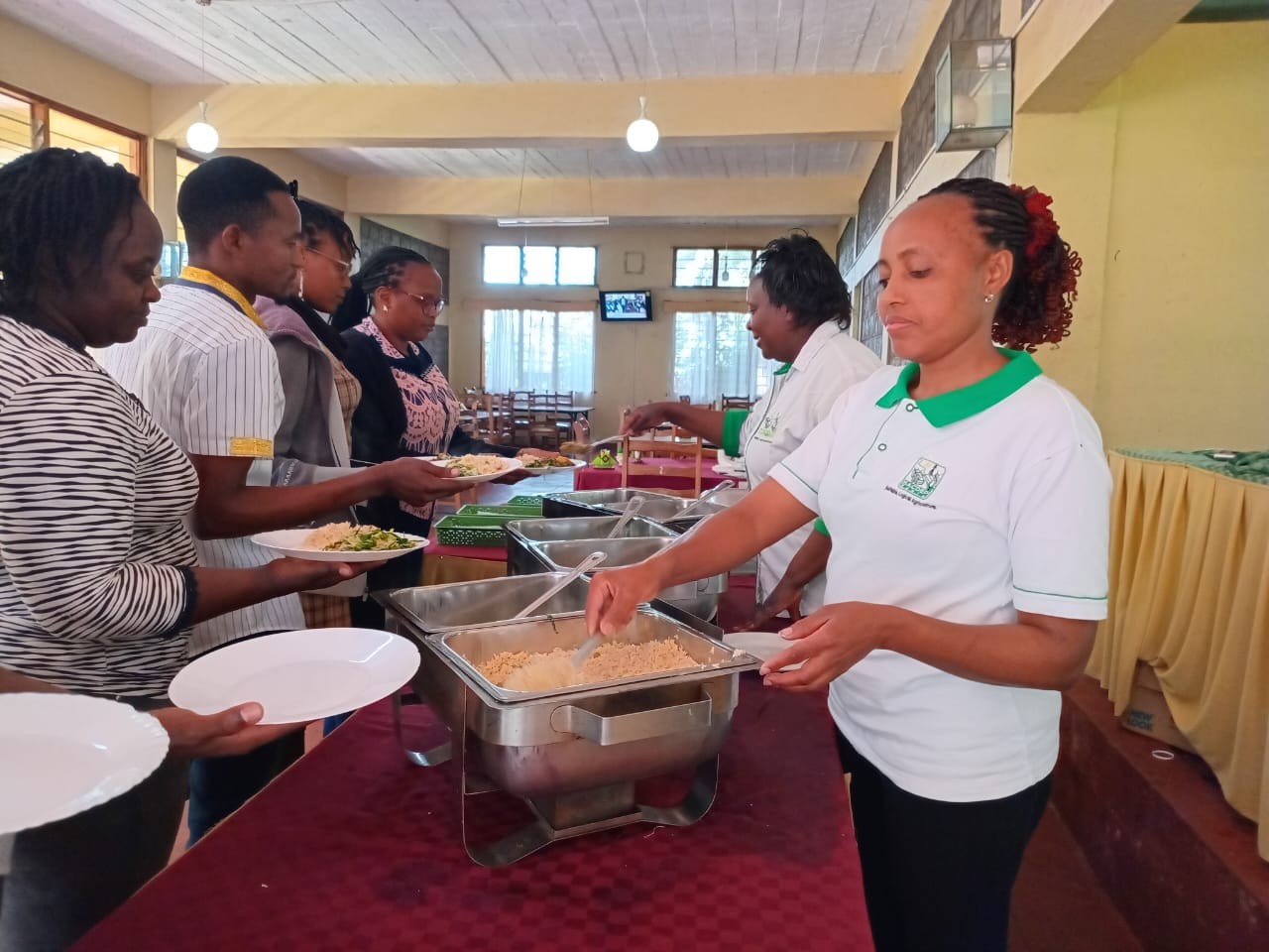 Guests Being served in the dining hall.