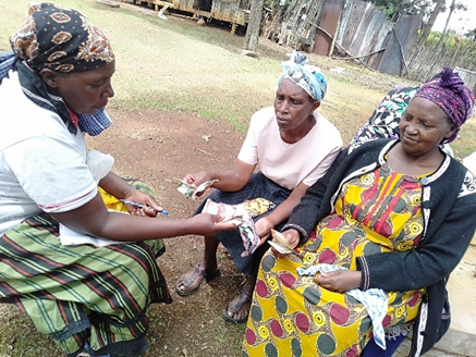 Members of Kauwi Ngomano during a Banks without walls (BWWs) session in Kitui West Project Area.