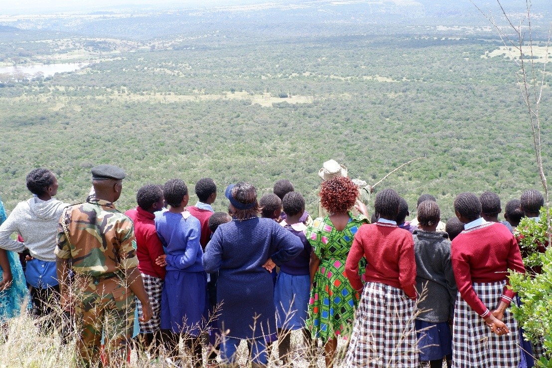 School Pupils in a learning session in the bush.