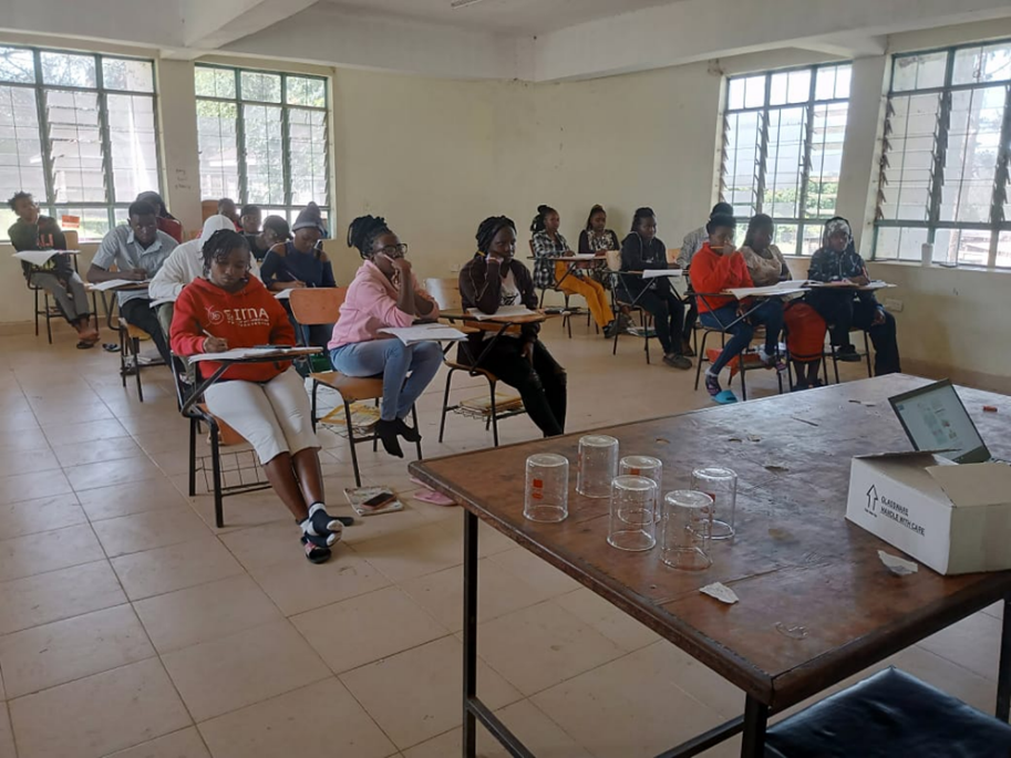 Students in class under instructions in class